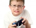 Kid playing video game - A new study shows that kids are at risk if they are "pathological gamers."