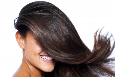 Finasteride at 5 mg per day showed promising results in premenopausal women with hair loss.