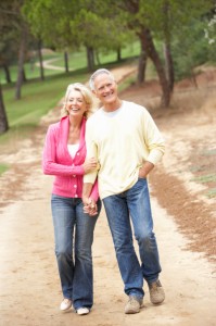 middle age couple walking, laughing