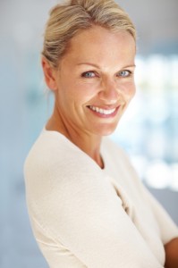 mid adult woman, smiling