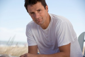 Portrait of man sitting outside