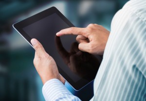 Man using digital tablet