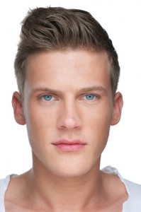 Portrait of a young, fair-skinned man.