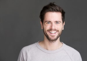 Mid adult man, smiling