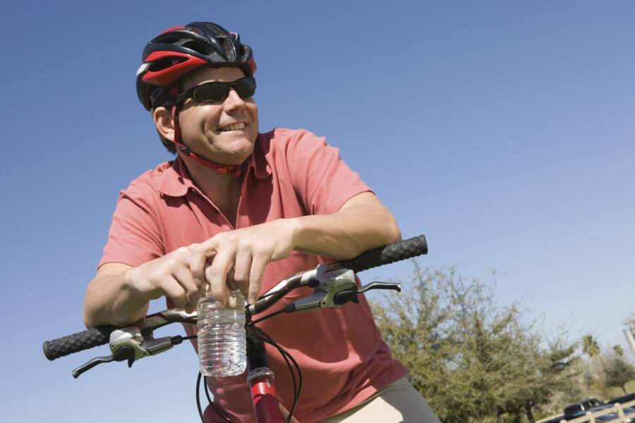 Man taking a rest while riding a bike