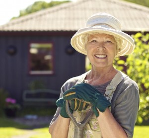mature woman working in garden