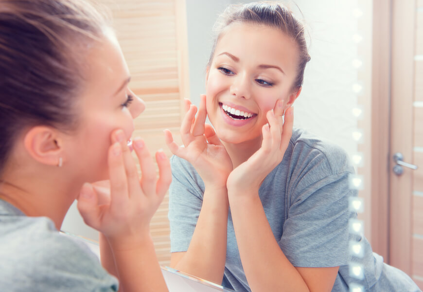 Woman Using MetroGel for Rosacea