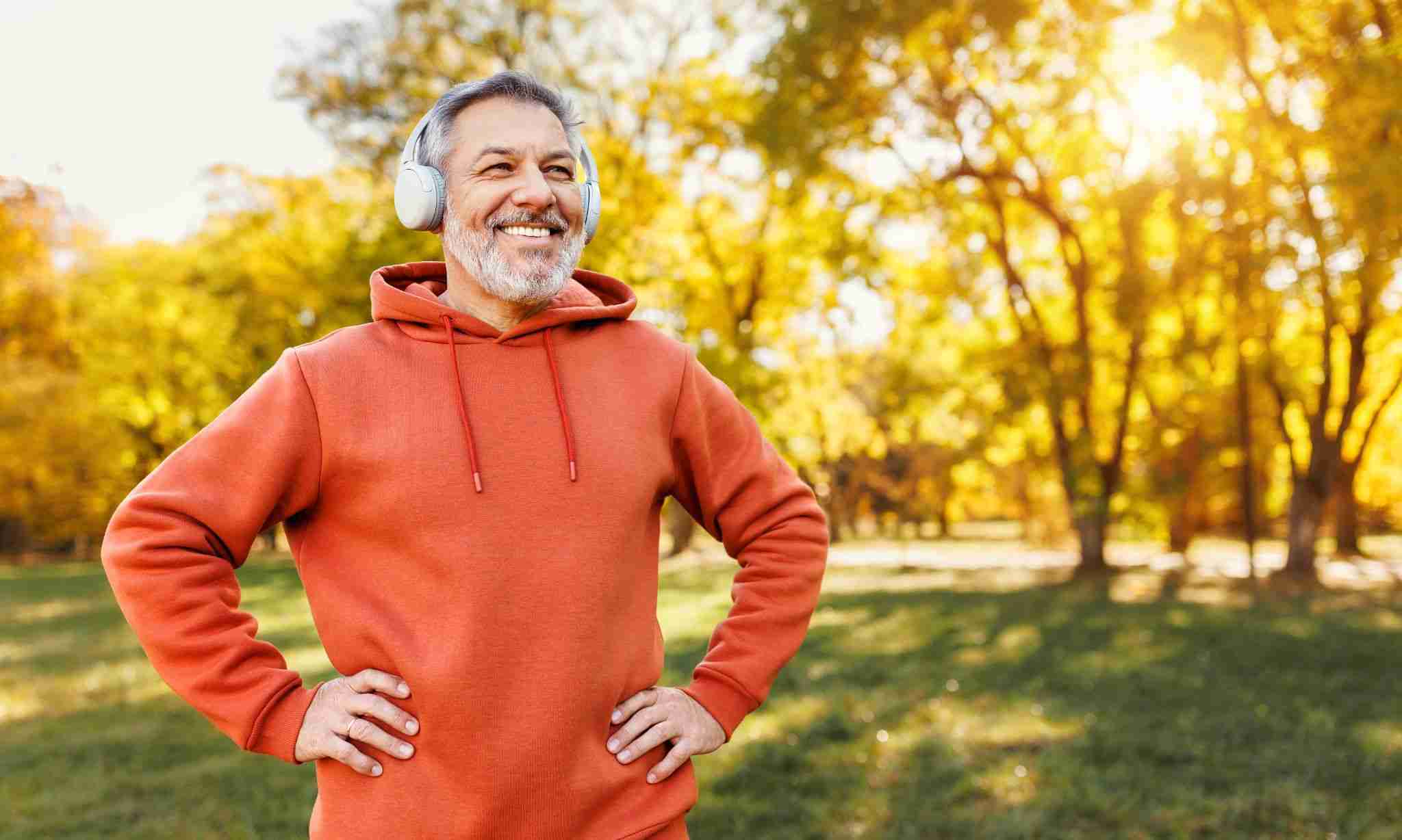 A Man Smiling After a Jog man working out outdoors before taking viagra