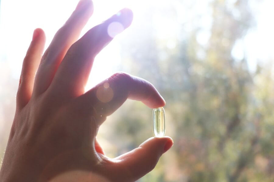Person holding a.pill.
