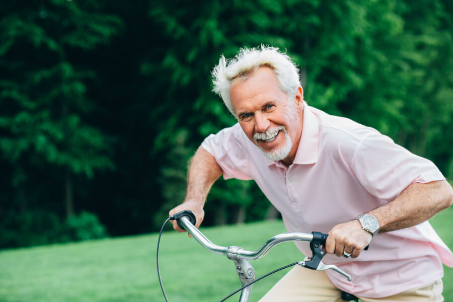 Man riding a bicycle.