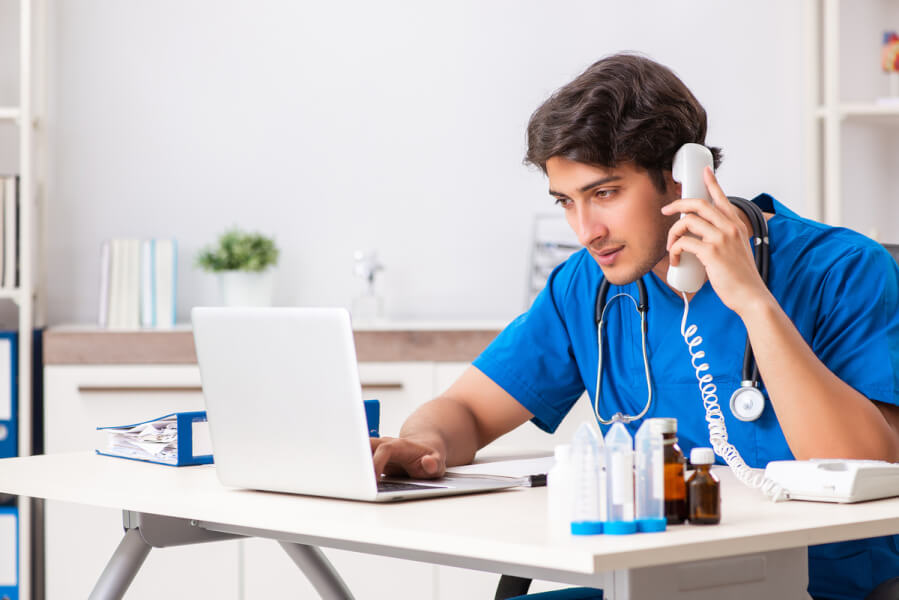 Medical doctor speaking on the phone.