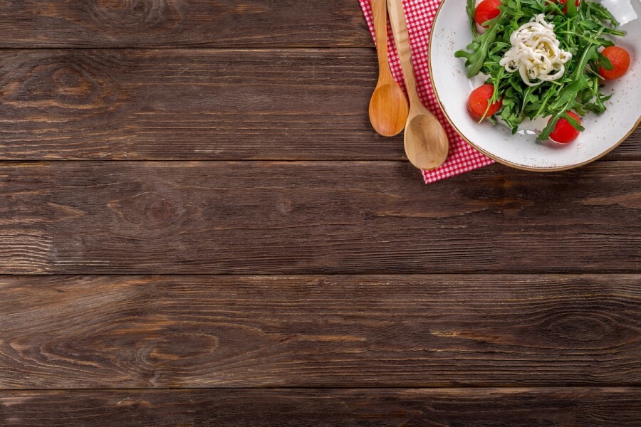 Tabletop with salad plate.