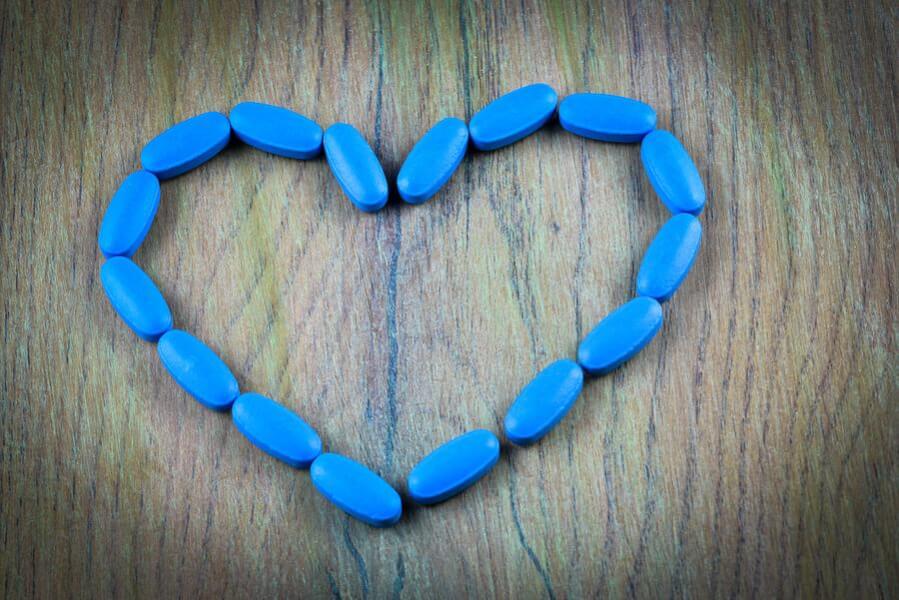 Viagra pills formed into a heart.