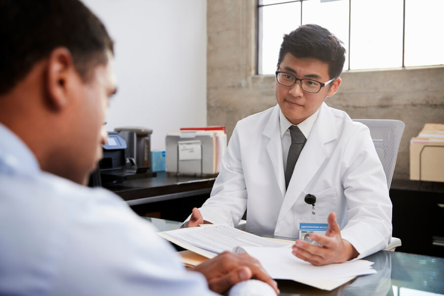 Man consulting a medical doctor.