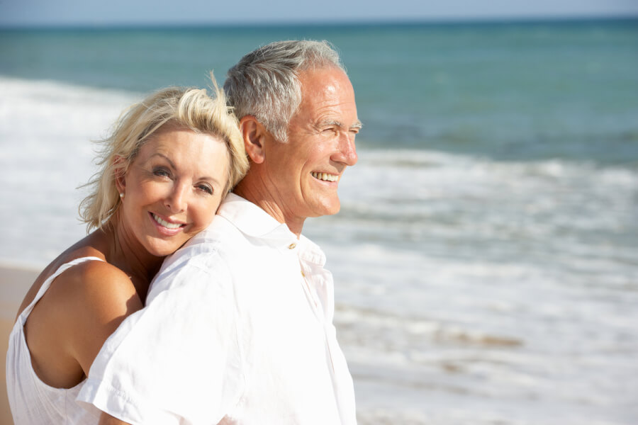 Man and woman on a beach.