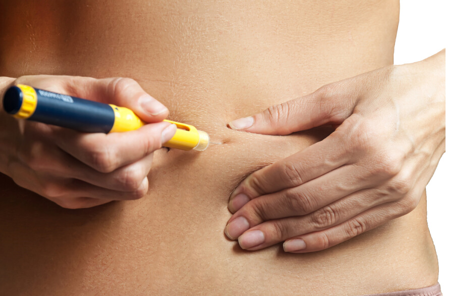 Woman injecting herself.