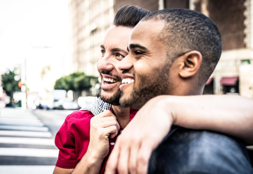 Two smiling men.