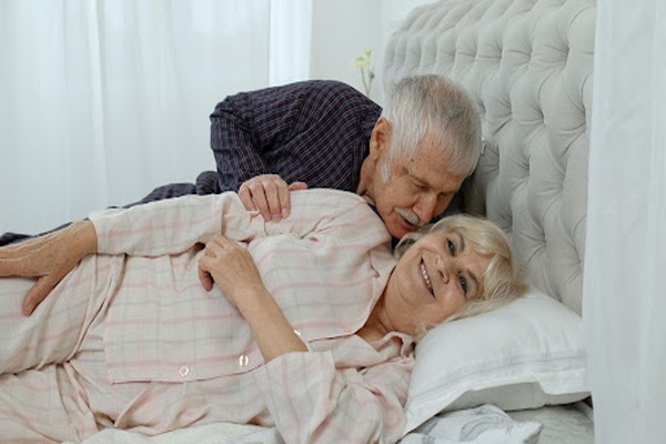 Happy older couple in bed Happy older couple in bed