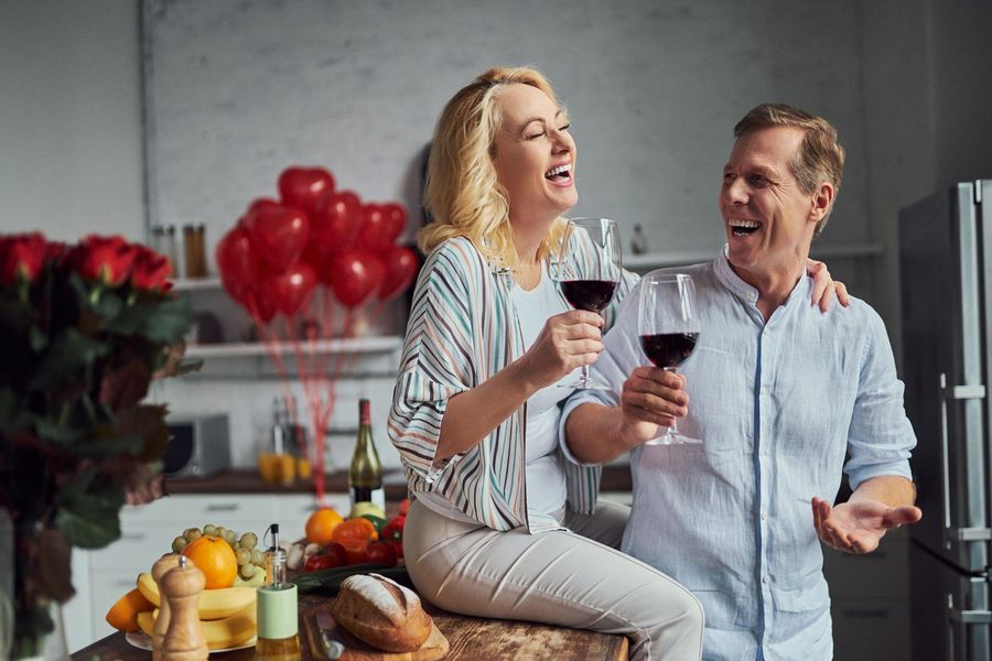 Young couple drinking red wine