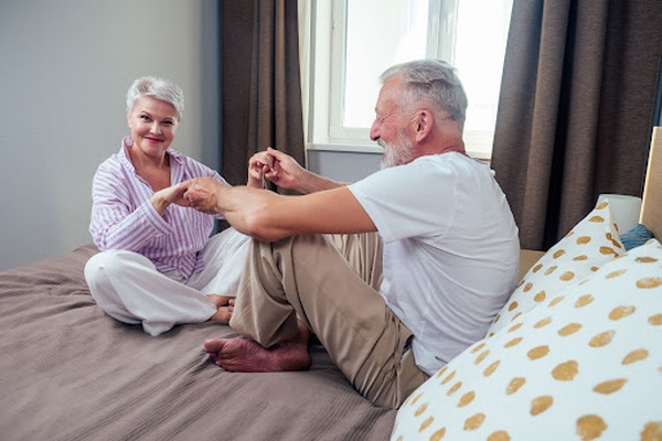 Happy older couple in bed Happy older couple in bed