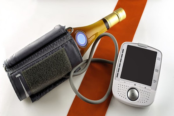 Bottle with a blood pressure cuff Bottle with a blood pressure cuff