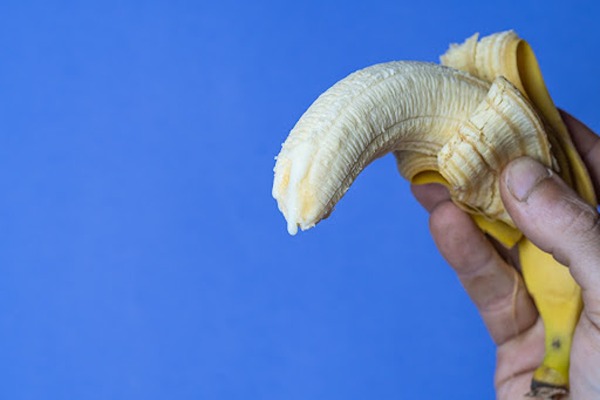 Peeled banana pointing down Peeled banana pointing down
