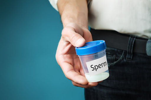 sperm sample in a container sperm sample in a container