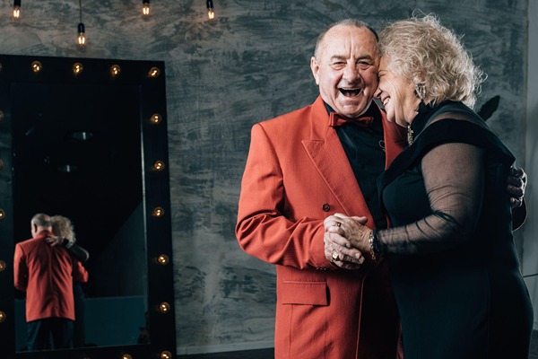 Older couple dancing and laughing Older couple dancing and laughing