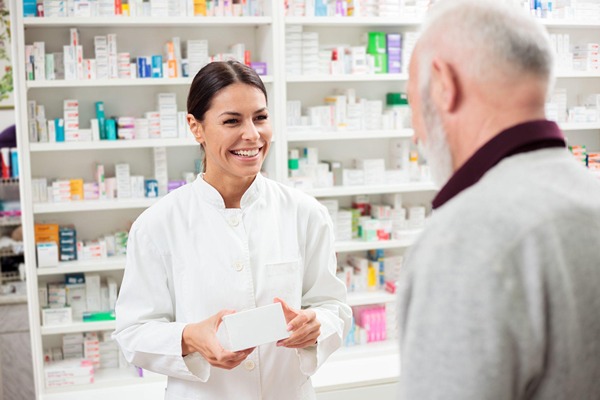 Pharmacist talking to patient Pharmacist talking to patient