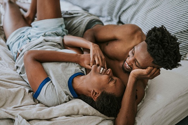 Happy couple in bed Happy couple in bed