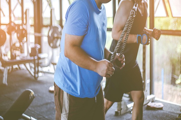 Men training at the gym Men training at the gym