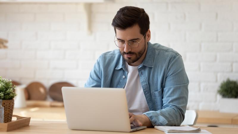 Man on a laptop Man on a laptop