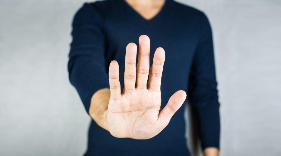 Man showing "stop" with his hand