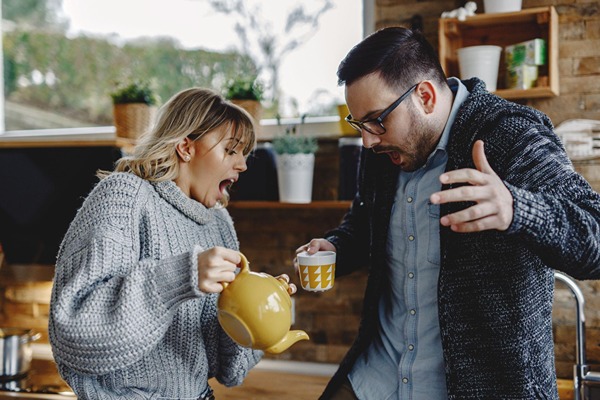 Woman spilled tea on a man Woman spilled tea on a man