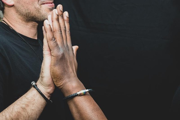 Couple touching hands Couple touching hands