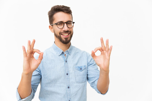 making ok signs with hands