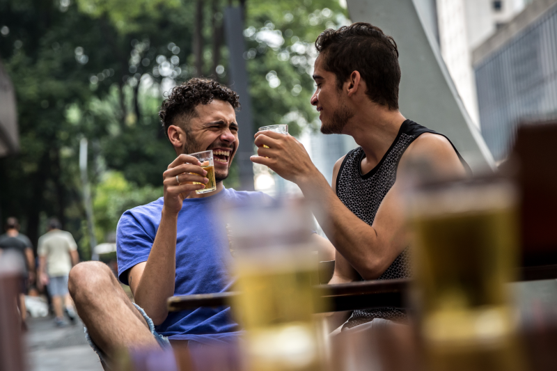 gay couple having drinks