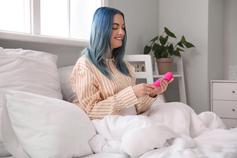 woman holding a vibrator