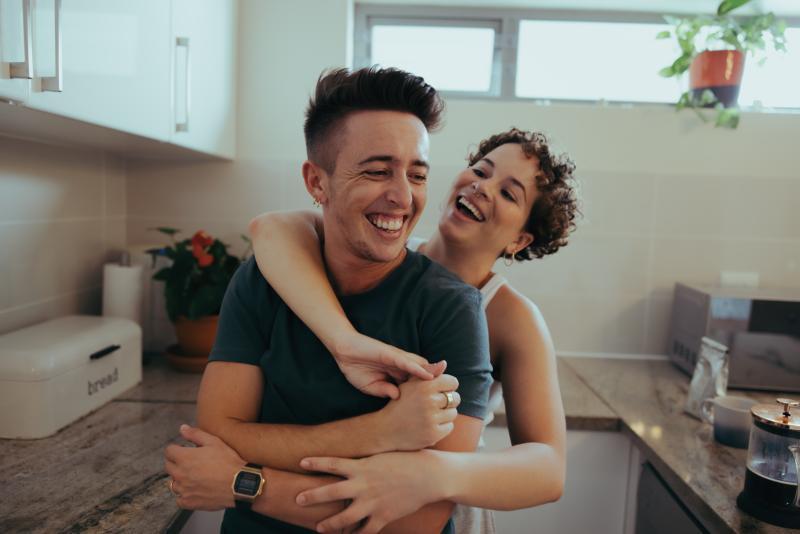 playful couple in the kitchen