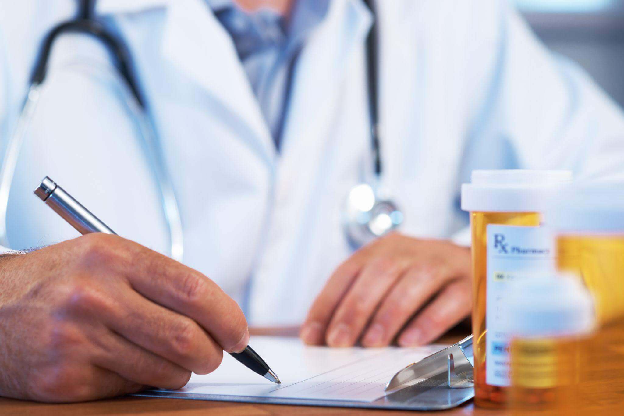 doctor writing