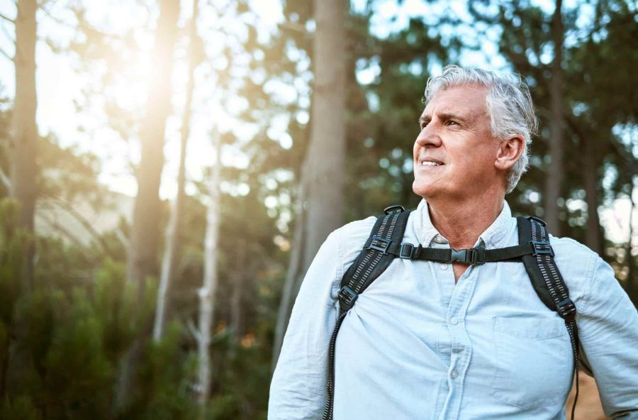 middle-aged man trekking