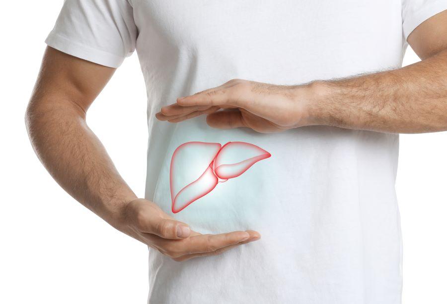 a man showing the location of his liver