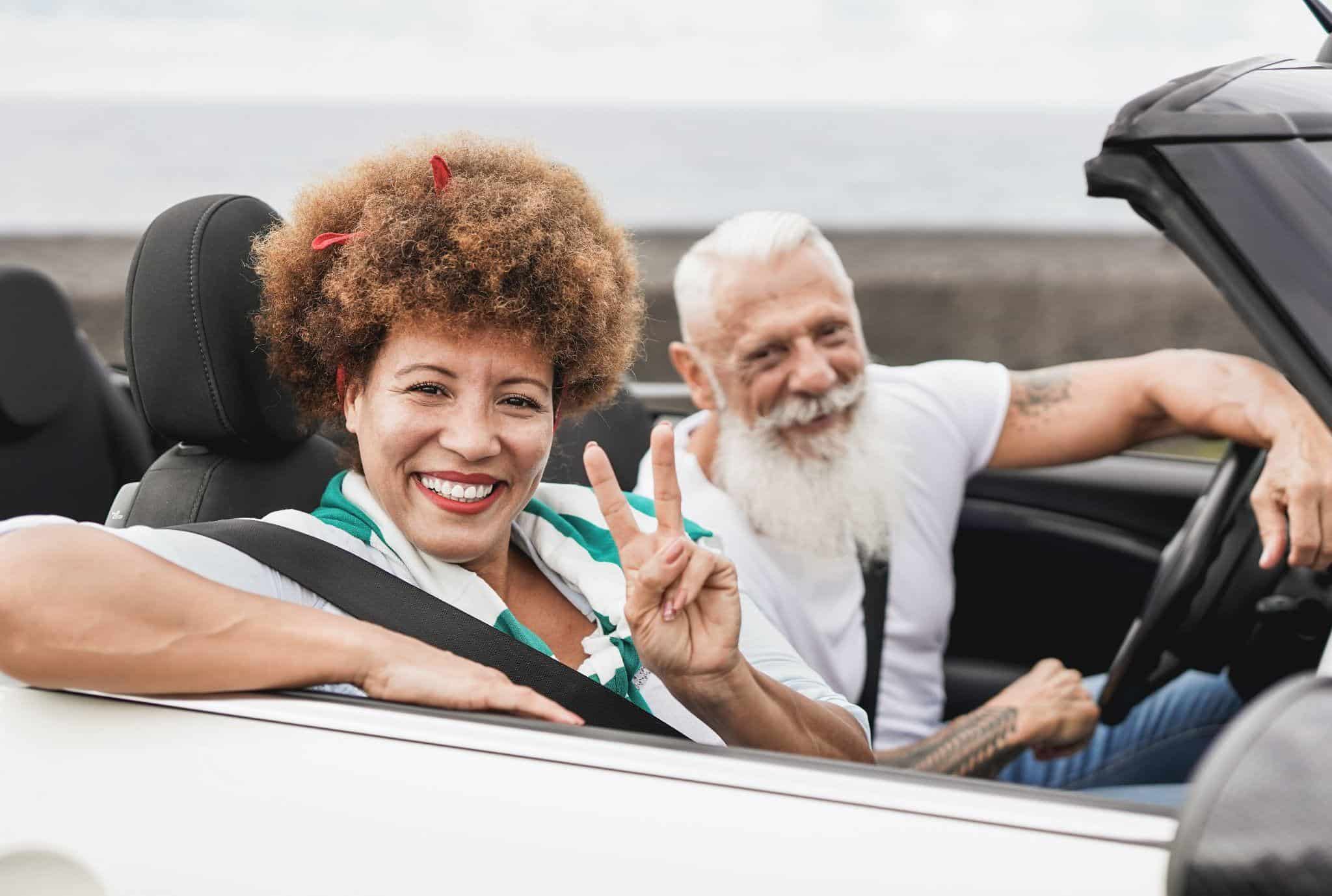 happy middle-aged couple in a car