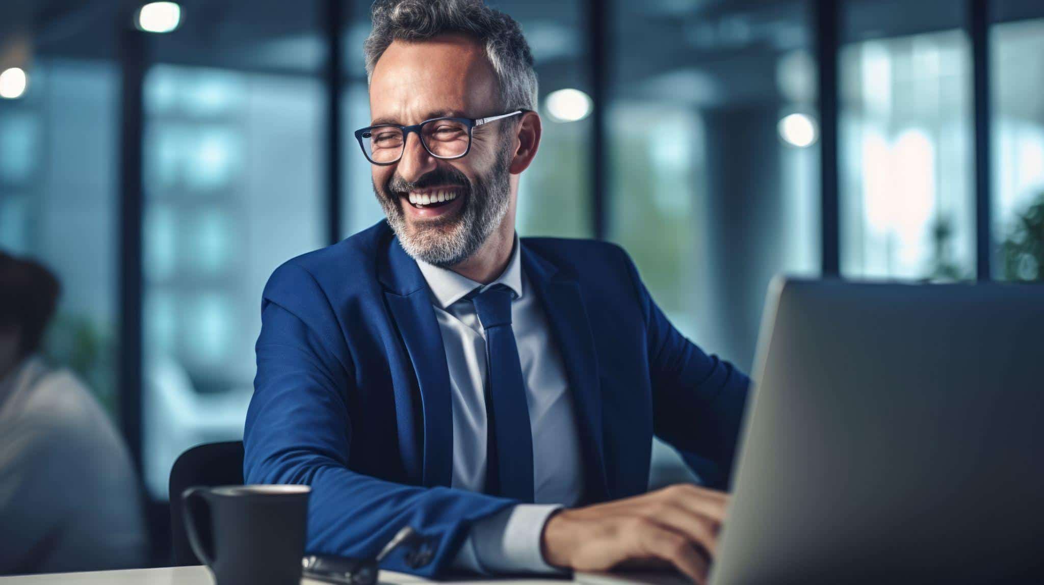 smiling man in a suit in an office