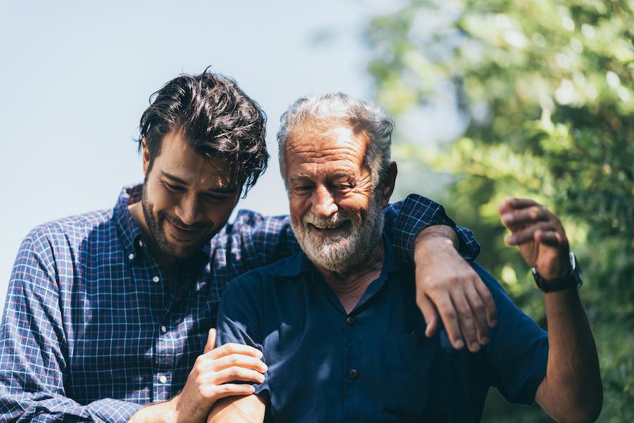 young and old man smiling