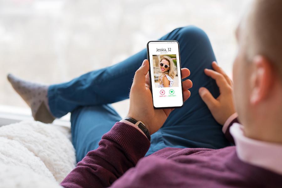 man on a dating app on his phone