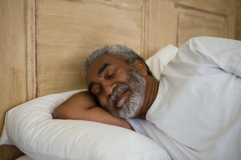 elderly man sleeping profoundly