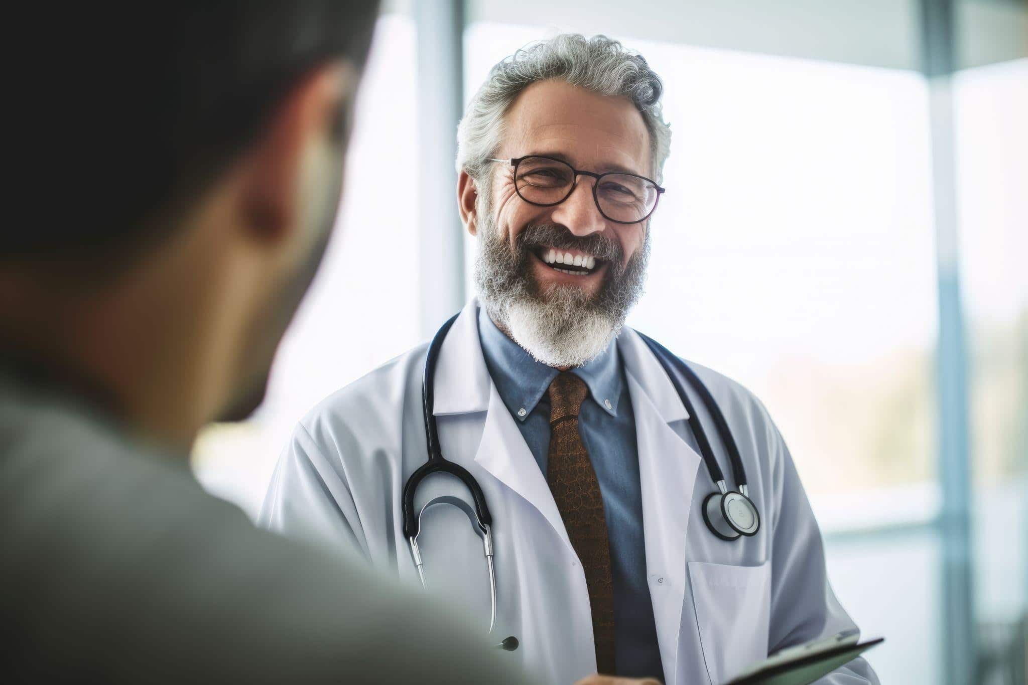 doctor smiling and talking with patient