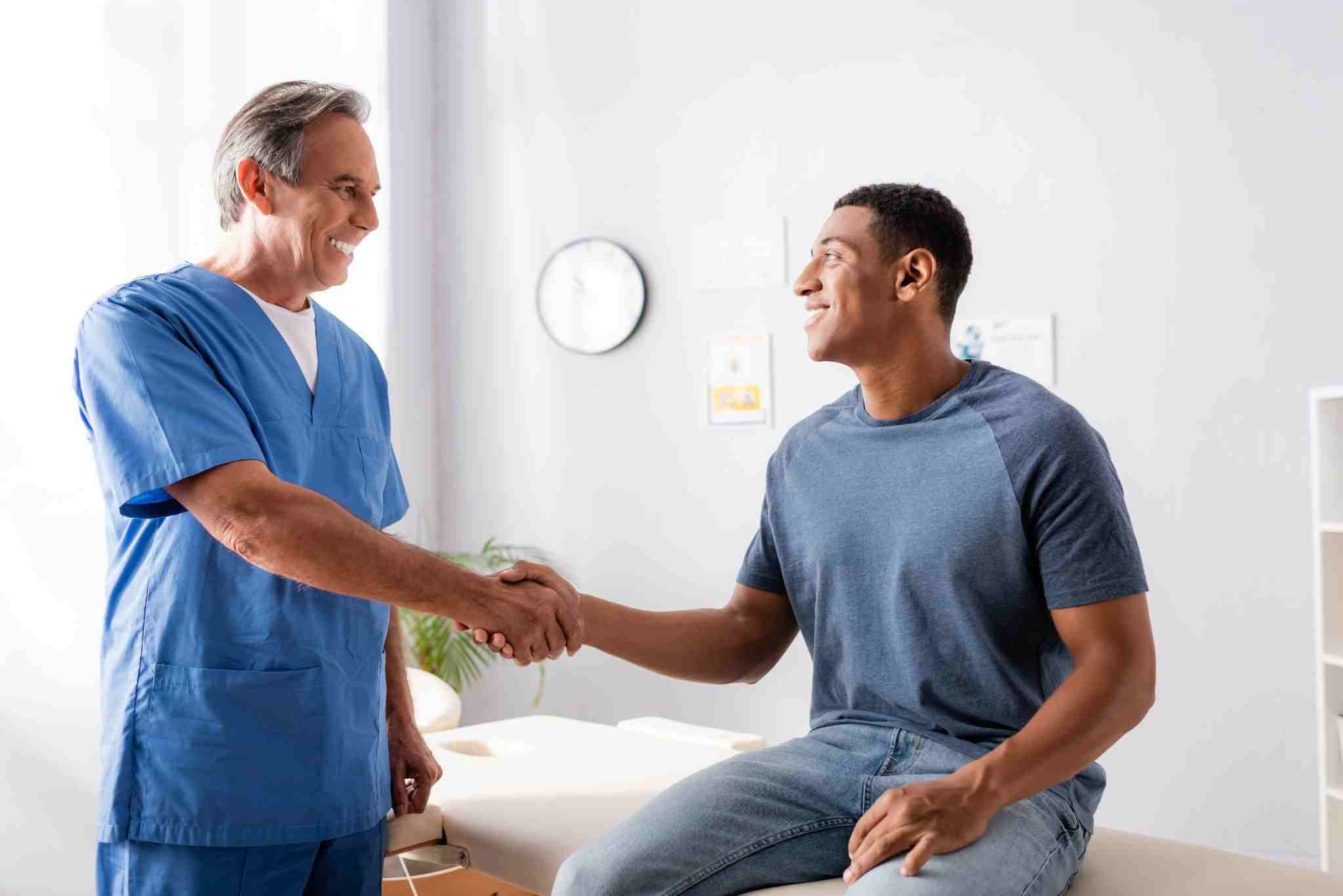 doctor shaking hands with patient who takes viagra