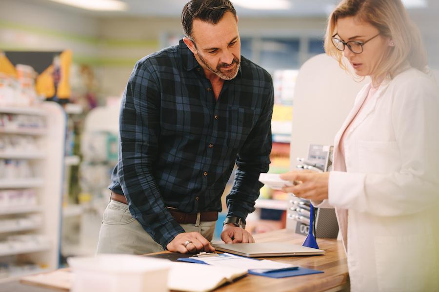 customer buying medicine at the drugstore